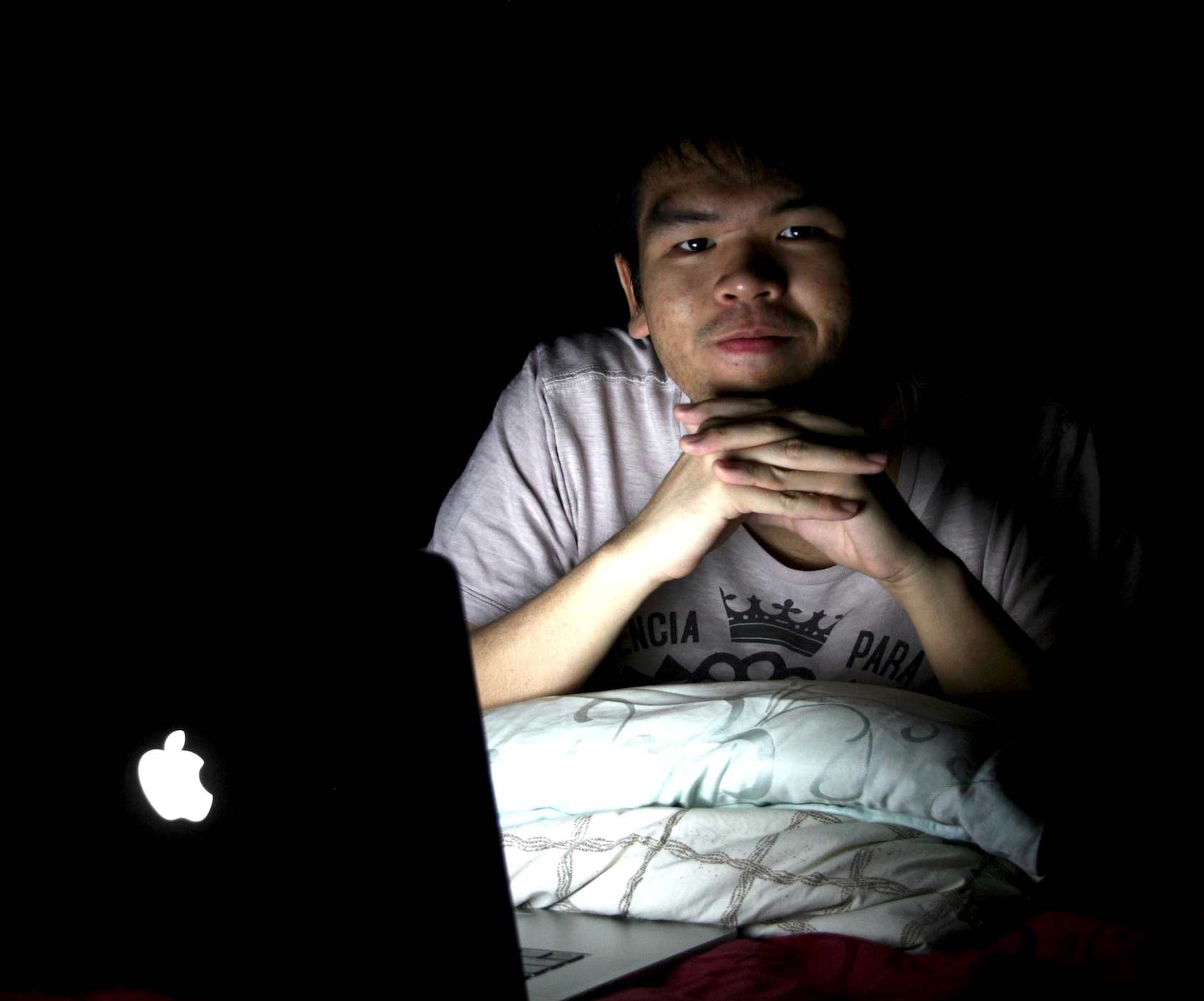 A picture of me looking very happy in front of a computer.